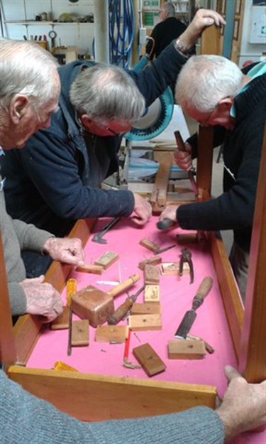 Moss Vale Men's Shed repairing a table