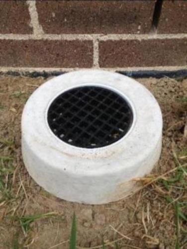 Overflow Gully trap with inner black grate, with concrete outer grate