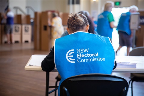 Image of NSW Electoral Commision volunteer and voting location.
